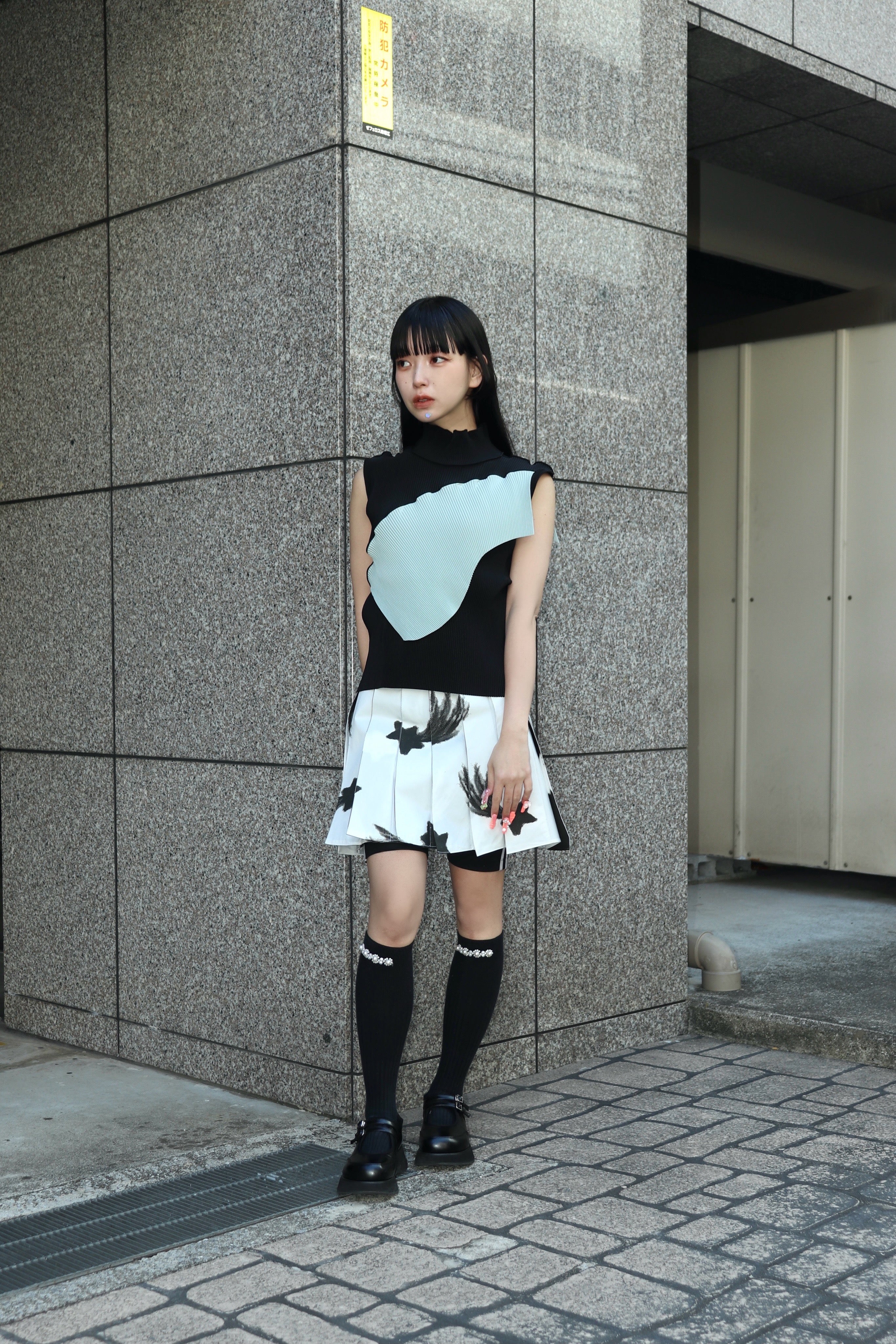 kotohayokozawa(コトハヨコザワ)のTODO WAVE TOP SLEEVELESS HIGHNECK