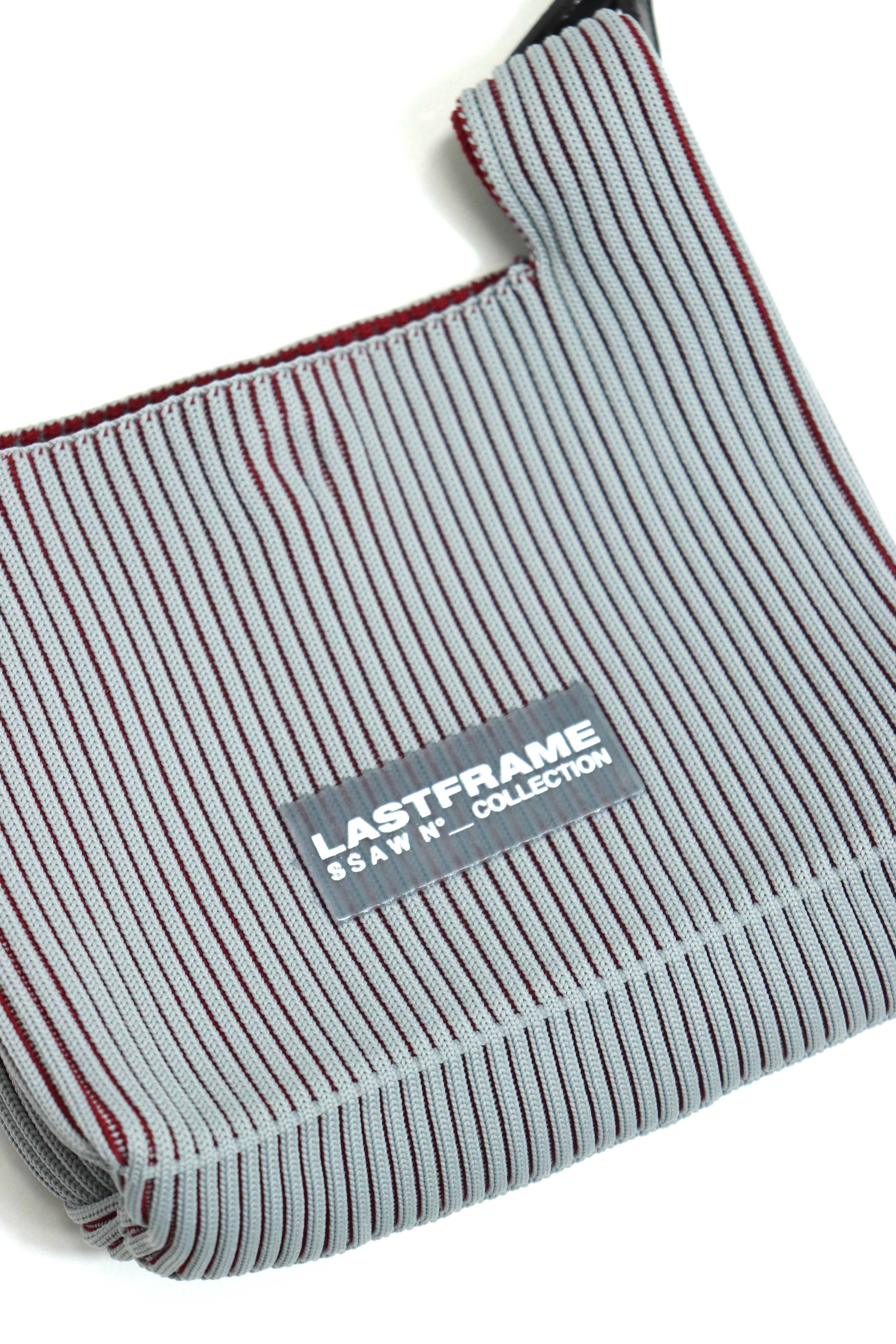 LASTFRAME(ラストフレーム)のWRAP BAG MINI STRAP GRAY BURGUNDYの通販