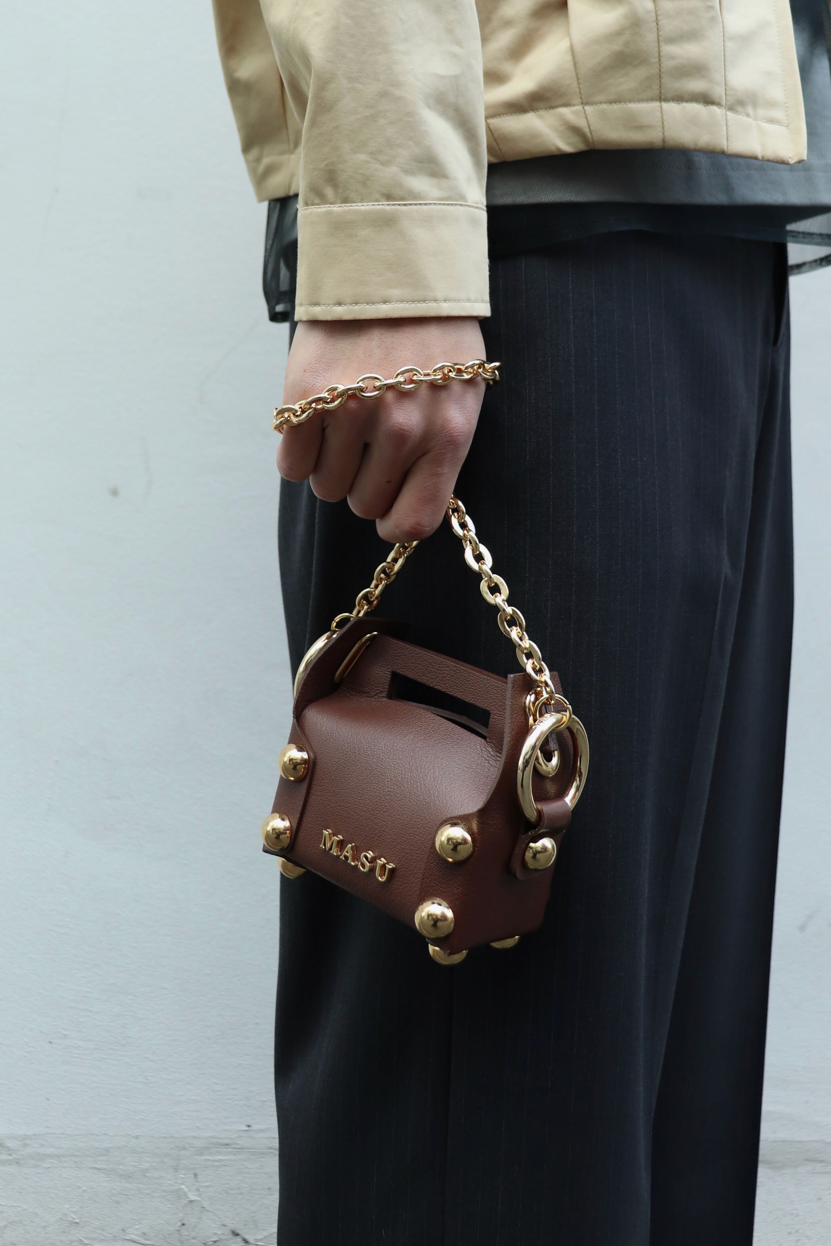 MASU(エムエーエスユー)のLEATHER CAKE BAG PETIT CHOCOLATE(バッグ)の