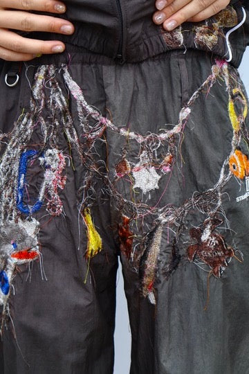 doublet(ダブレット)のEMBROIDERED CHAIN TRACK PANTS CHACORLの通販