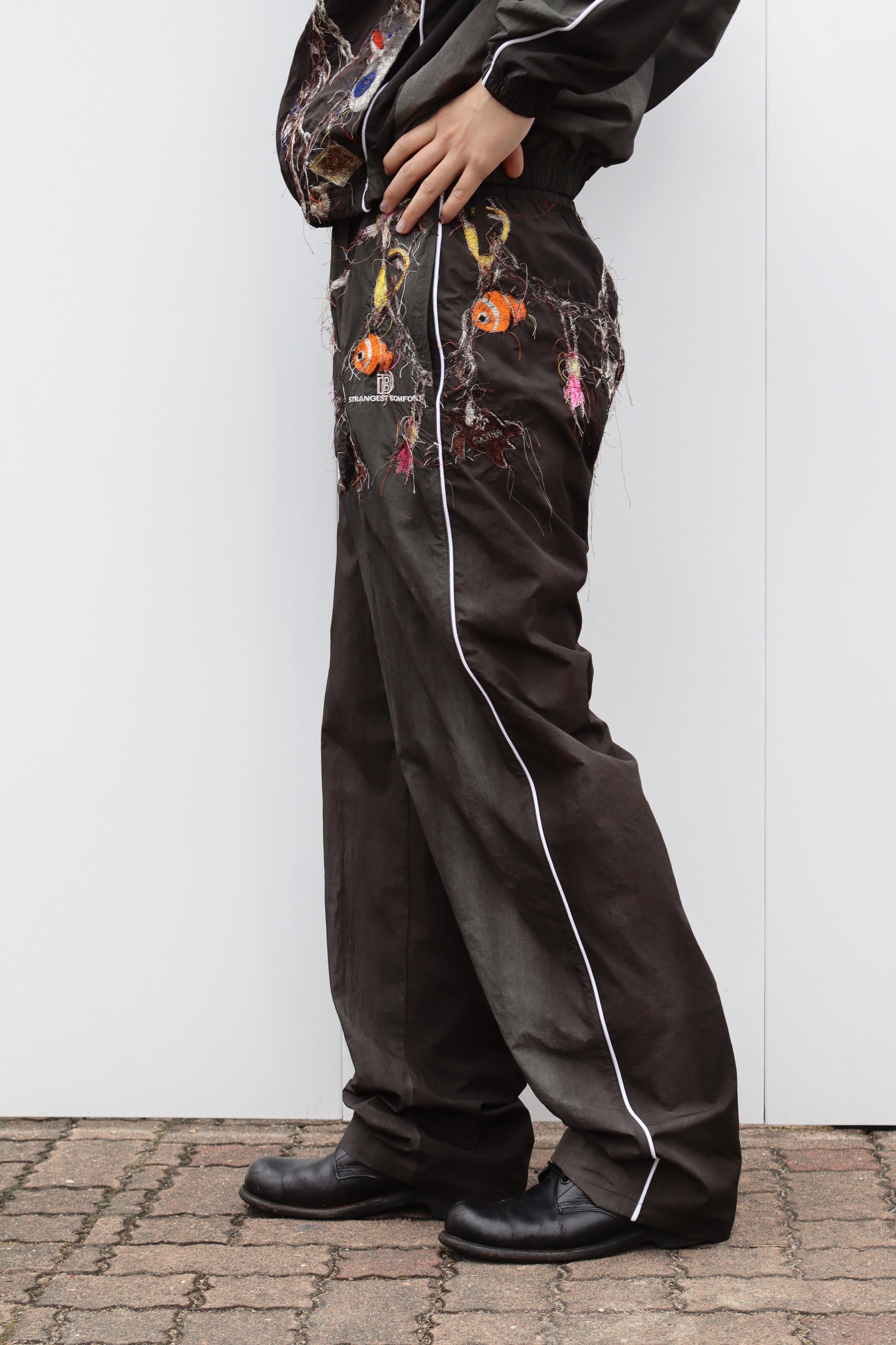 doublet(ダブレット)のEMBROIDERED CHAIN TRACK PANTS CHACORLの通販