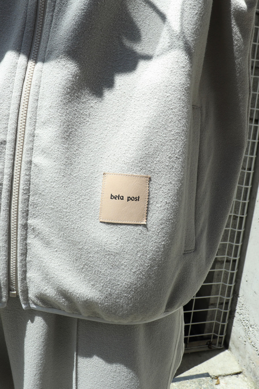 beta post  amida line track jacket