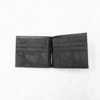カガリユウスケ(KAGARI YUSUKE)の黒壁 マネークリップ型二つ折り財布の