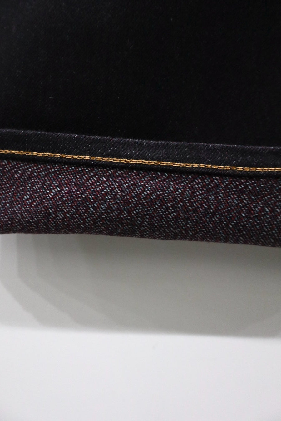 SUGARHILL  TWISTED HEATHER DENIM PANTS WIDE CUT(RED × BLACK)