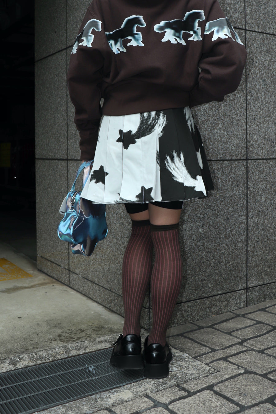 LEEANN HUANG(リーアン ホアン)のSHOOTING STAR FLIP PLEAT MINI SKIRT