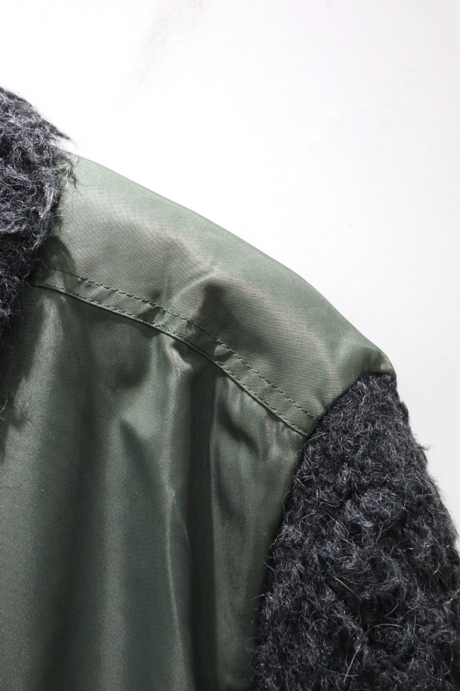 Oscar Ouyang  BOMBER JACKET WITH FAUX FUR SLEEVES AND COLLAR