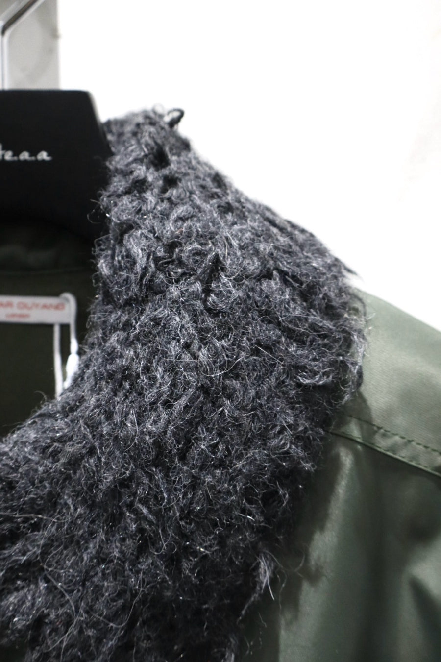 Oscar Ouyang  BOMBER JACKET WITH FAUX FUR SLEEVES AND COLLAR