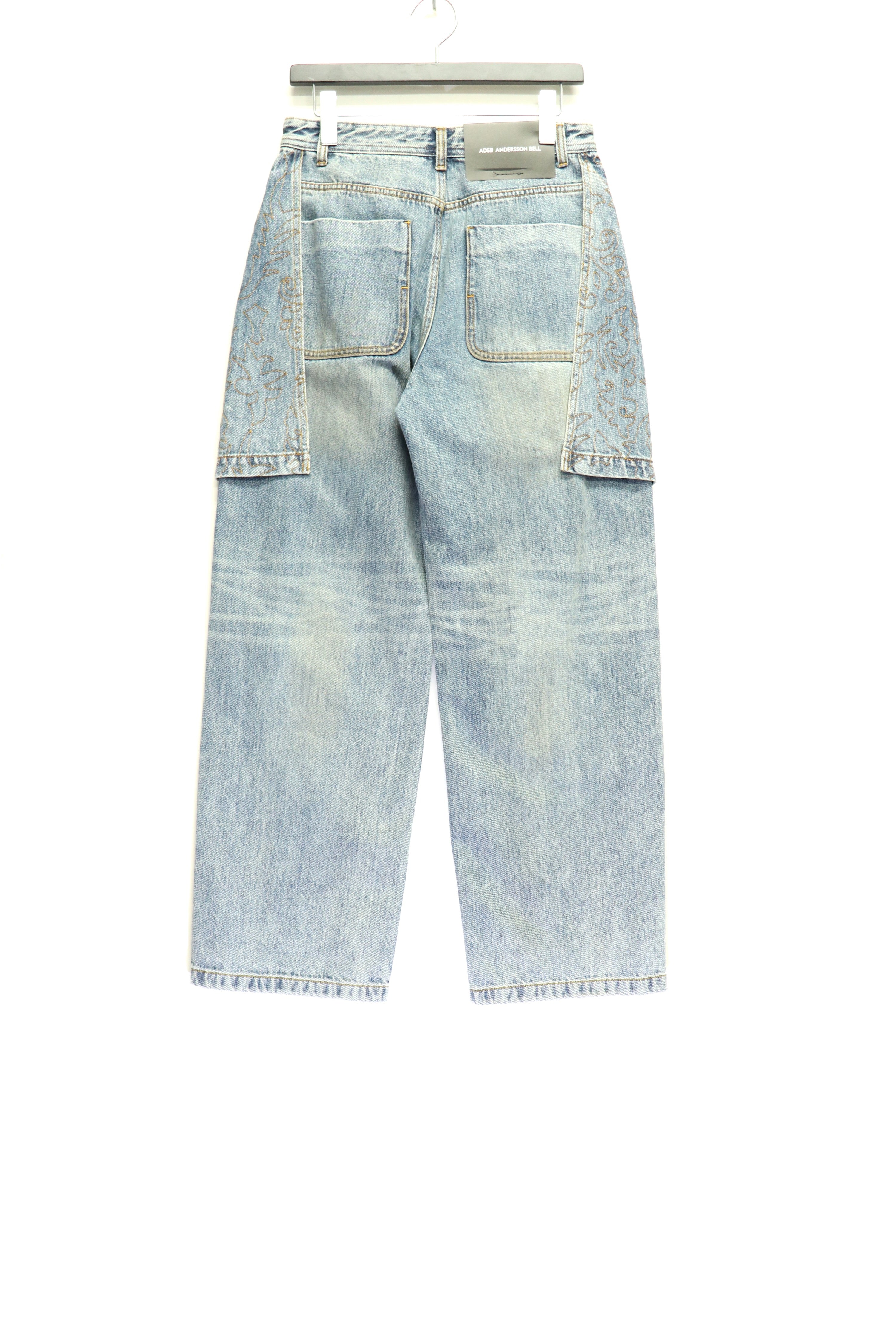 ANDERSSON BELL(アンダースンベル)のEMBROIDERY WRAP JEANS WASHED