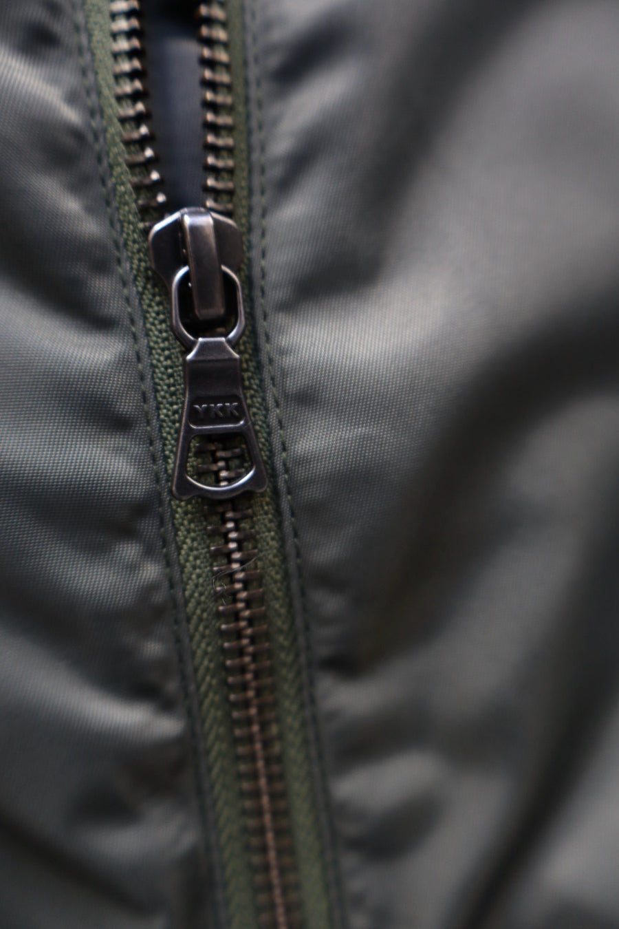 Oscar Ouyang  BOMBER JACKET WITH FAUX FUR SLEEVES AND COLLAR