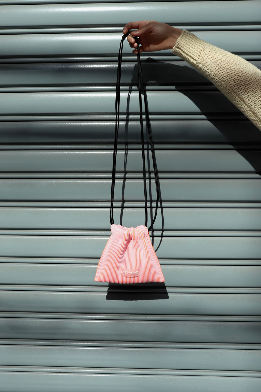 LASTFRAME  KASANE SACK BAG MINI(LIGHT PINK × NEON ORANGE)