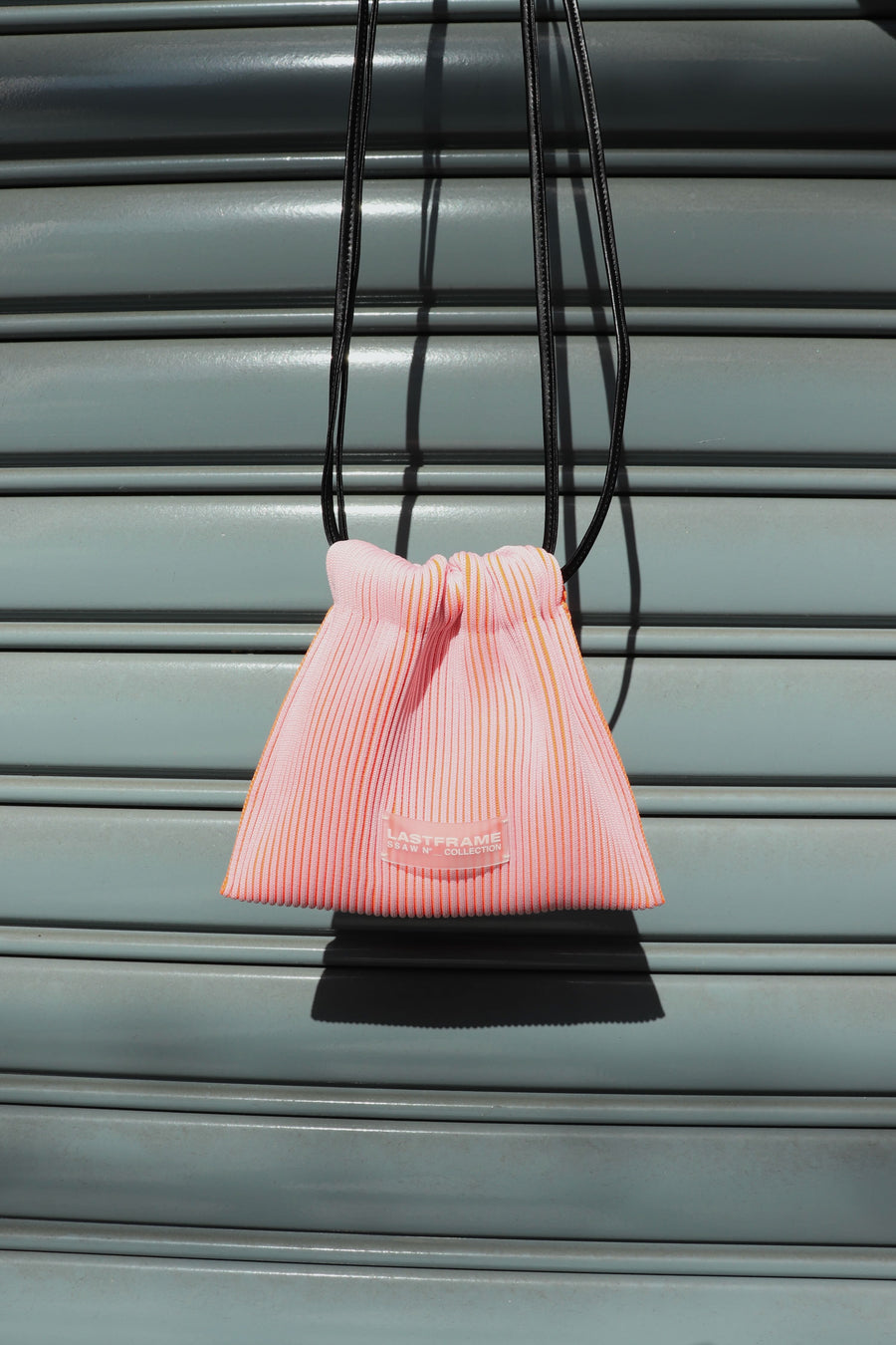 LASTFRAME  KASANE SACK BAG MINI(LIGHT PINK × NEON ORANGE)