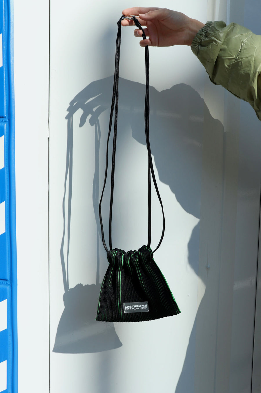 LASTFRAME  KASANE SACK BAG MINI(BLACK × NEON GREEN)