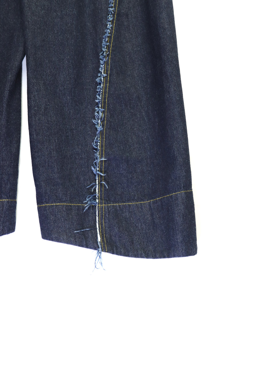 YUKI HASHIMOTO  RAW EDGE TWISTED JEANS