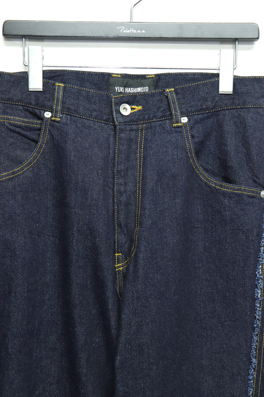 YUKI HASHIMOTO  RAW EDGE TWISTED JEANS