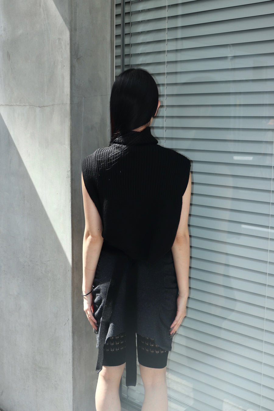 JUUKIFF  BONDAGE HIGH-NECK VEST IN WOOL