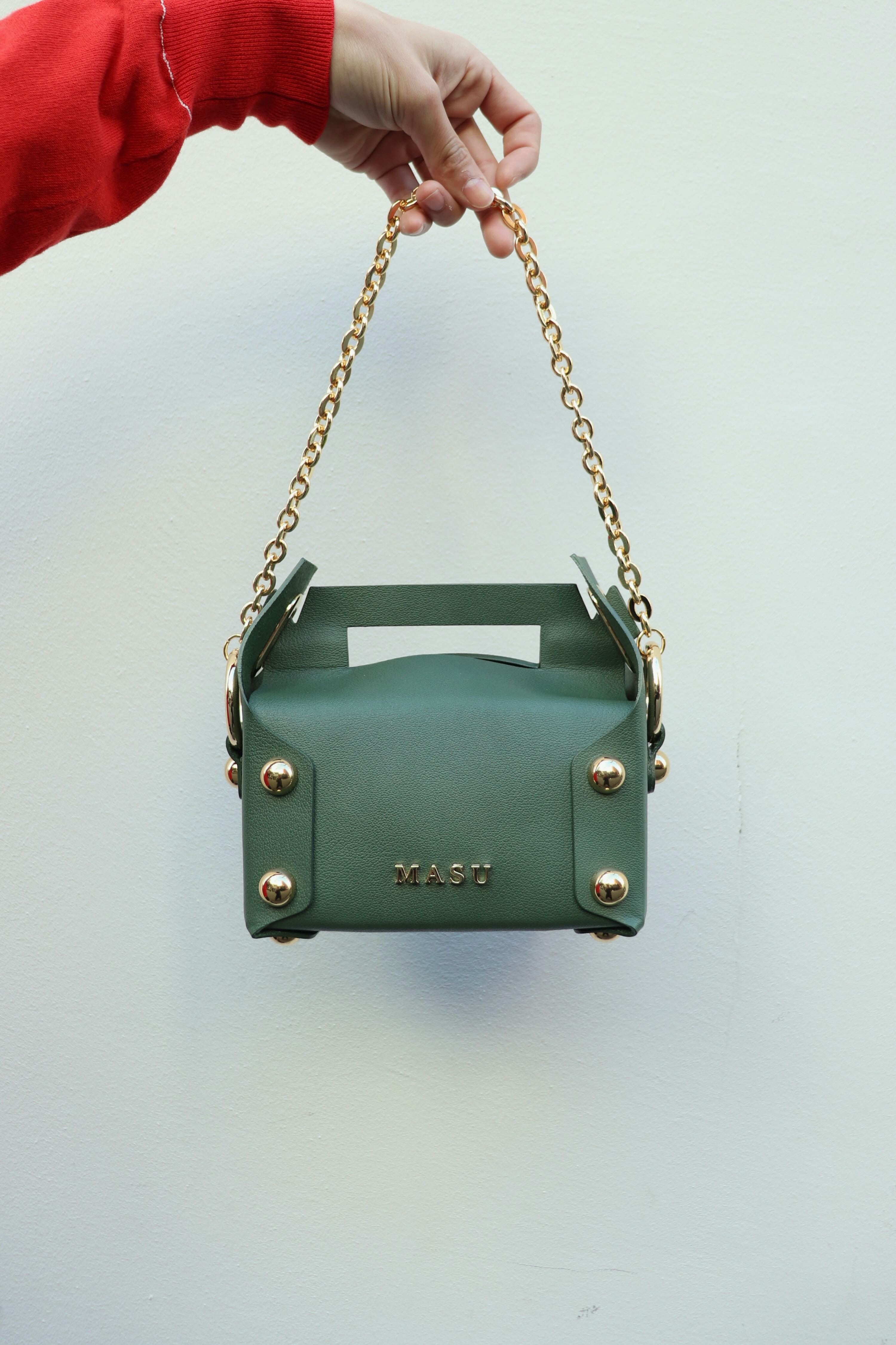 MASU(エムエーエスユー)のLEATHER CAKE BAG MOSS GREEN(バッグ)の通販
