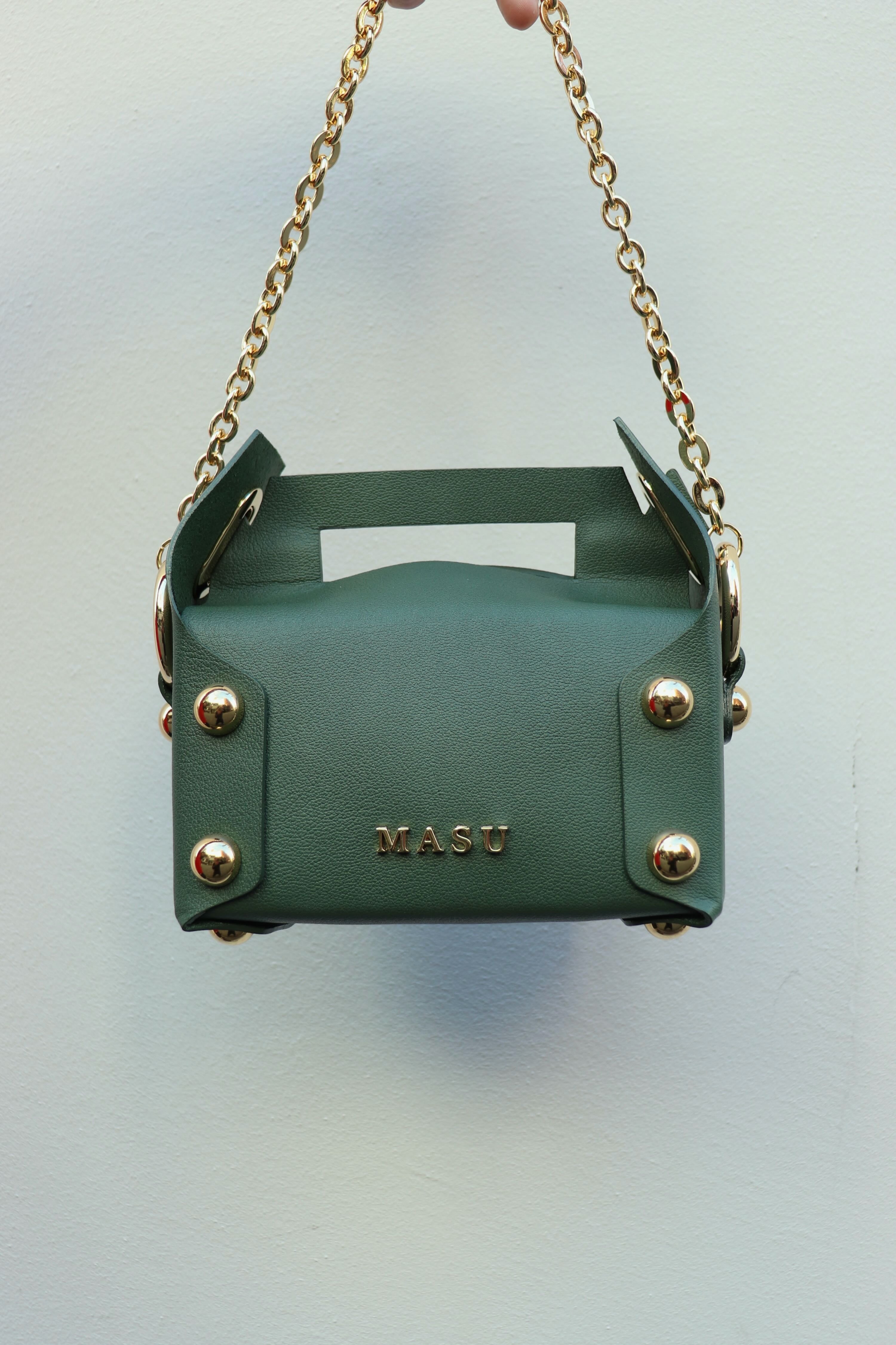MASU(エムエーエスユー)のLEATHER CAKE BAG MOSS GREEN(バッグ)の通販