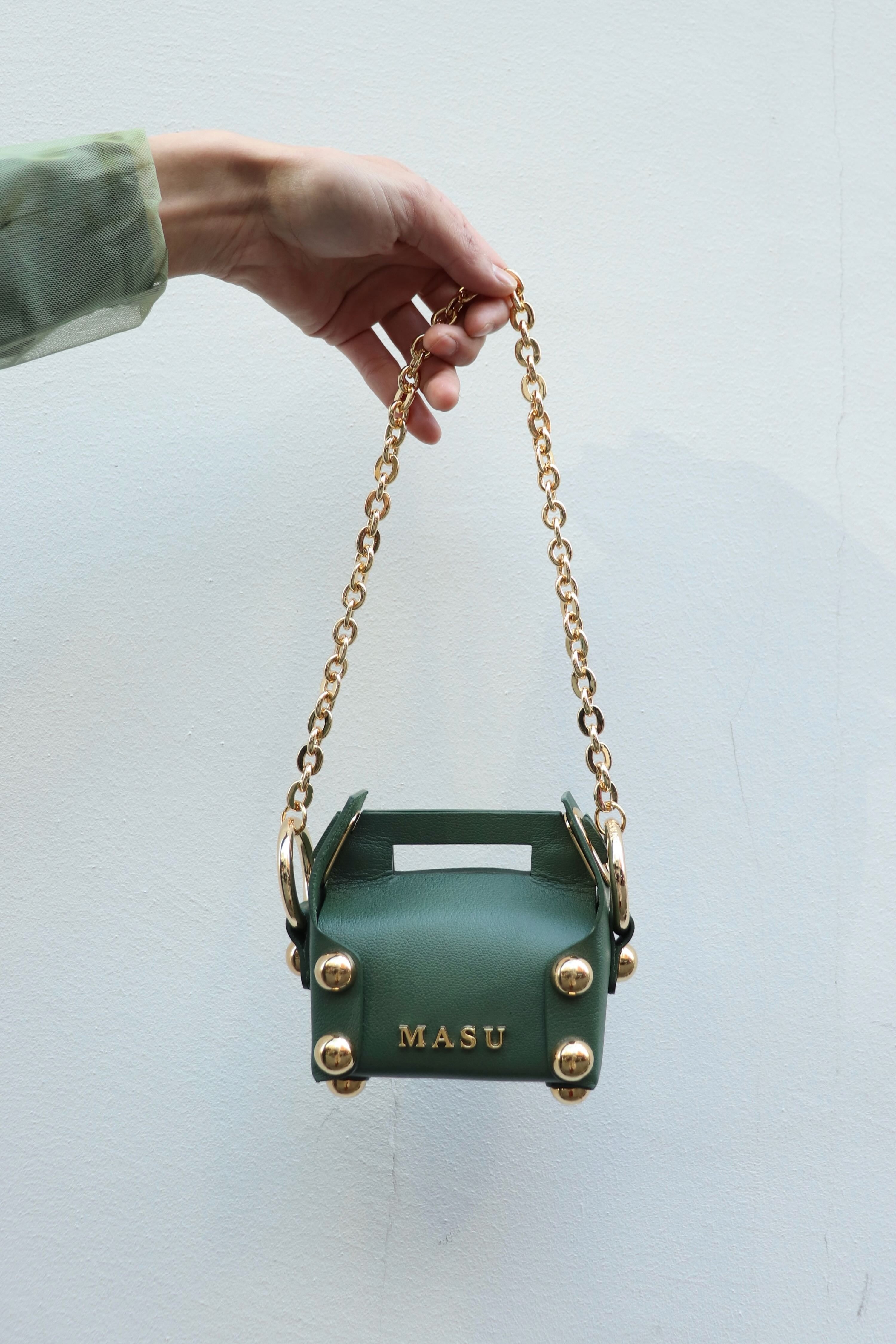 MASU(エムエーエスユー)のLEATHER CAKE BAG PETIT MOSS GREEN(バッグ