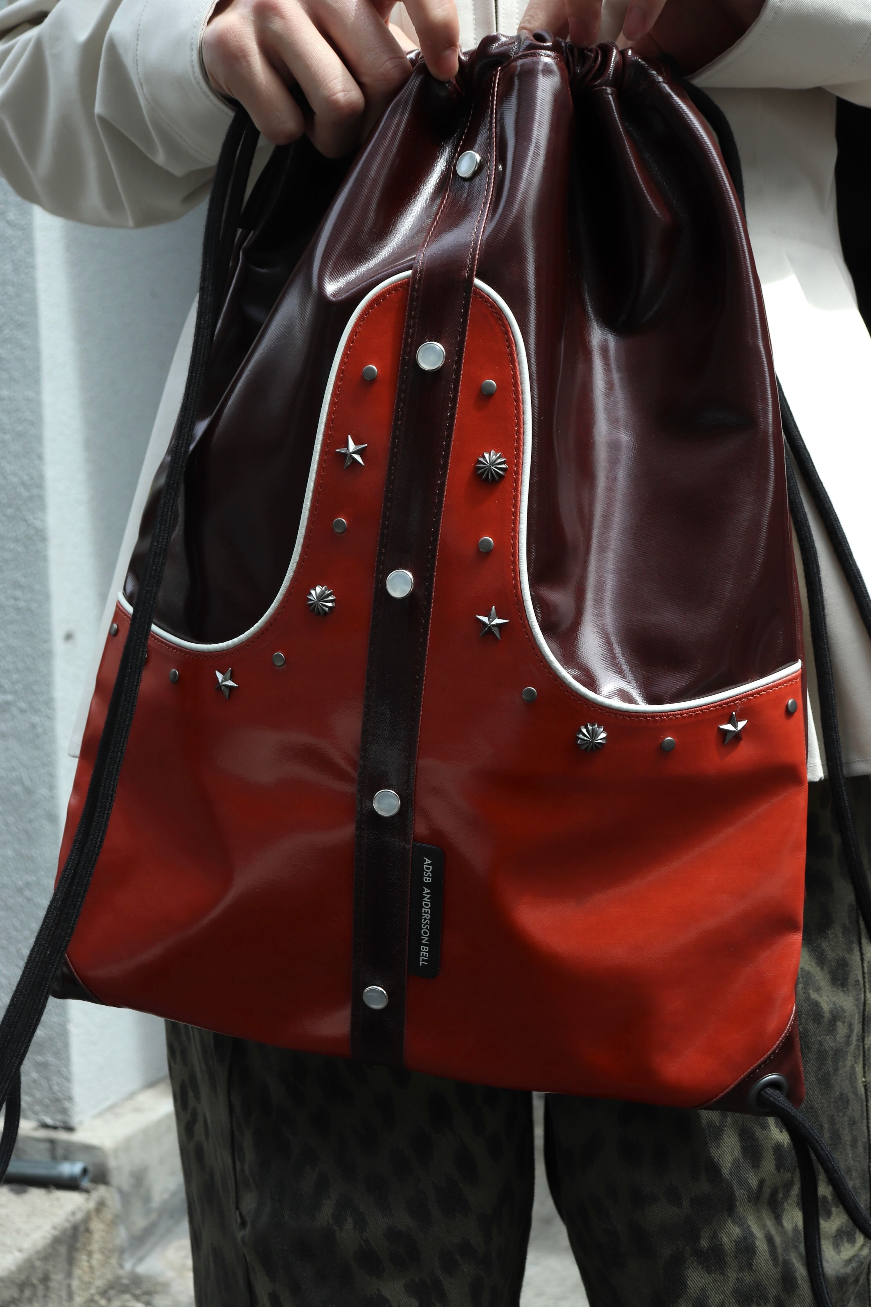 ANDERSSON BELL(アンダースンベル)のWESTERN DRAWSTRING BAG BROWNの