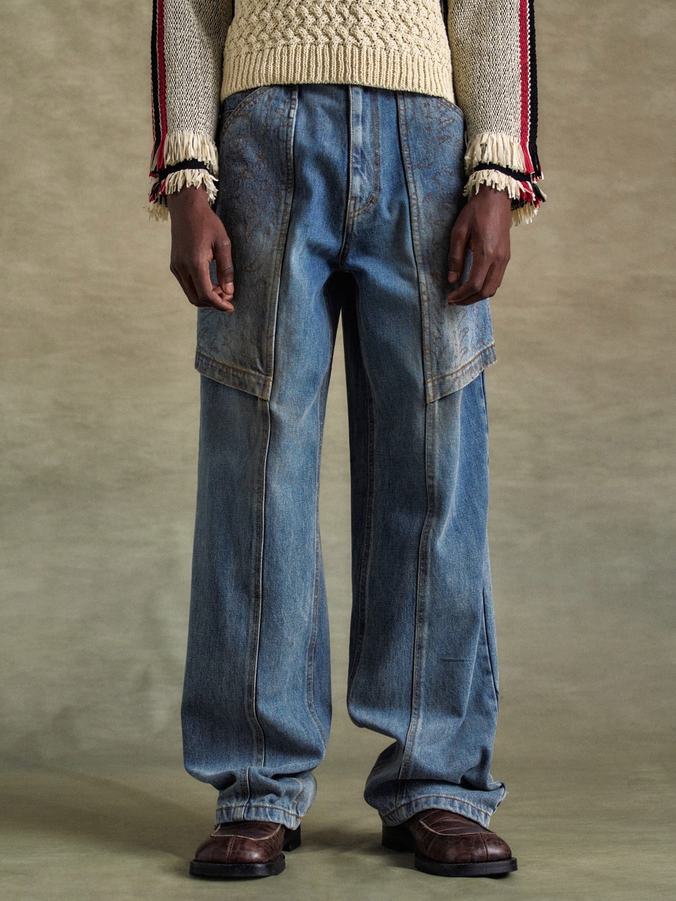 ANDERSSON BELL(アンダースンベル)のEMBROIDERY WRAP JEANS WASHED