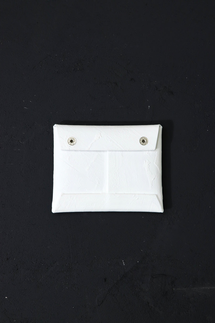 カガリユウスケの封筒型の白壁コインケースの画像